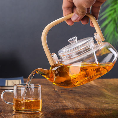 Прозрачный зацветая бак чая с фильтром, рукой дунутая чашка чая установленная с чайником поставщик