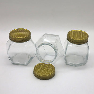 Опарник меда прозрачной еды безопасный воздухонепроницаемый, опарникы стекла шестиугольника меда хранения поставщик